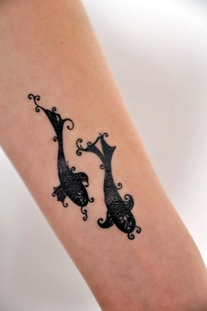 Tatuagens de peixes para as mulheres Tatuagens de peixes para as mulheres