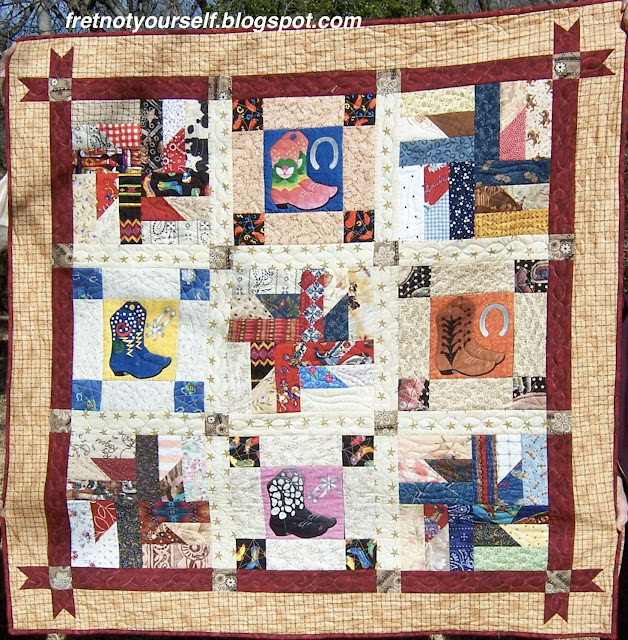 Puddin' and Pie alternate set with Boot blocks The Puddin' and Pie blocks are alternately set with Boot blocks to create this nine-block baby quilt.