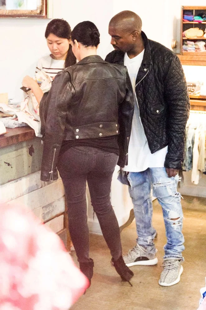 Pregnant Kim Kardashian and Kanye West shop baby clothes in NYC
