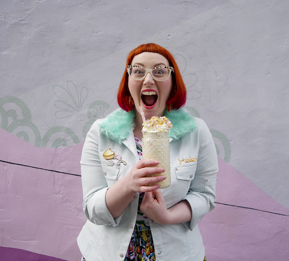 Wardrobe Conversations Blog Birthday Celebrations Styled by Helen, Wardrobe Conversations, Scottish Blogger, Edinburgh Blogger, Dundee Blogger, red head, ginger bob, Spex Pistols glasses, leopard print glasses, customised denim jacket, mint fur collar, Monki prints, Monki tshirt, Monki x Lynnie Zulu, Lynnie Zulu for Monki, River Island white lace up shoes, Rockcakes brooch, Rock Cakes pin badges, personalised denim jacket, Lucky Dip pins, milkshake with sprinkles, Roller Shakes, Blog Birthday, Style Diner, Kate George Mural Edinburgh, wall art Edinburgh, Edinburgh South side, Lou Taylor, tropical earrings, skinny dip london milk bag, novelty bag, milk bag