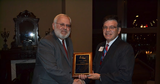 Dr. Howard McAlister Receives SLOS Award