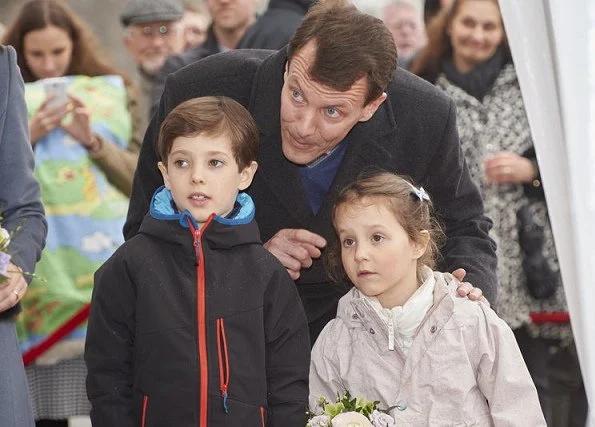 Prince Joachim, Princess Marie and their children Princess Athena and Prince Henrik attend opening of the Bakken amusement park in Klampenborg. Princess Marie wore Ralph Lauren wool coat