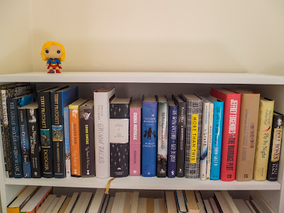 Top shelve up close: signed books by Neil Gaiman, Terry Pratchett, Philip Pullman, Margo Lanagan, Kate DeGoldi, Patrick Ness, John Green, Jeffrey Eugenides, Chimamanda Ngozie Adichie, Frances Hardinge and Holly Black
