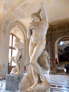 Michelangelo's two unfinished slaves.  The Louvre. Wow. Photo by Linda, if you know what I mean!