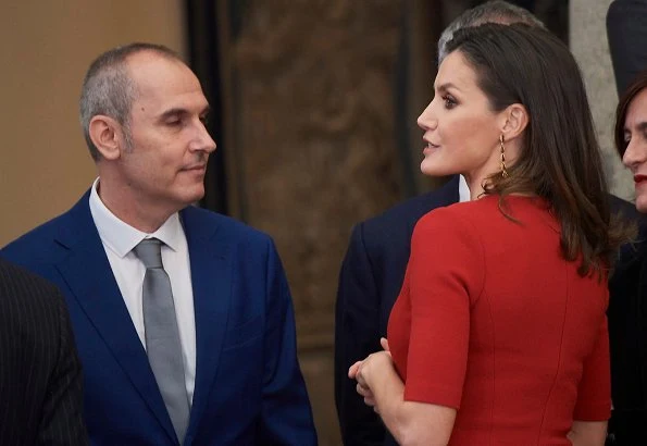 Queen Letizia wore Carolina Herrera red peplum stretch wool dress and Carolina Herrera clutch. Queen Sofia and Infanta Elena