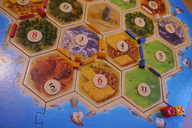 Review of the strategy board game Catan, great family fun for 8+ years