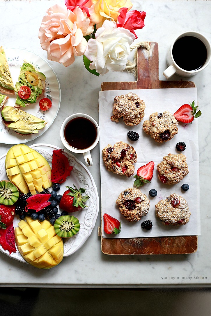 Oatmeal scones with berries A beautiful brunch spread with tropical fruit, avocado toast, and homemade oatmeal scones.