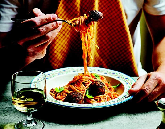 Vegan Aubergine 'Meatballs' over spaghetti in a tomato sauce