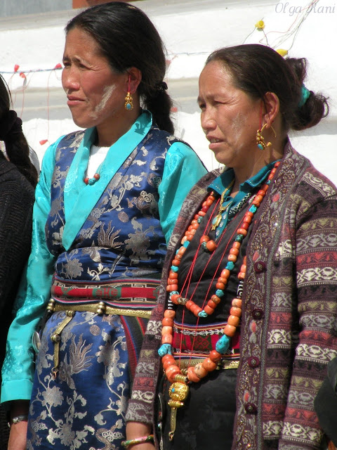 Tibetan women from Nepal wearing coral turquoise and dzi beads necklaces