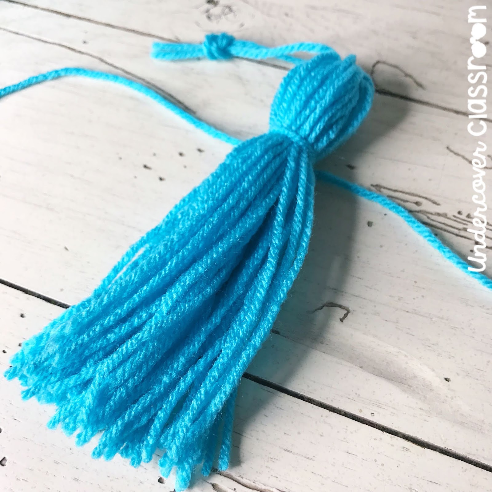 Make your own tassel garland from yarn. Here's how!