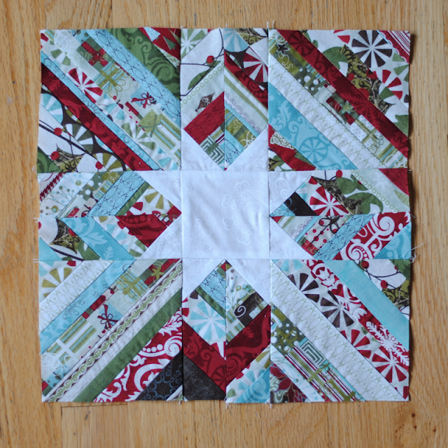 "Scrappy Christmas Star" is a Free Christmas Quilt Block Pattern designed by Jennie from Clover & Violet!