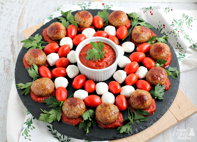 This easy to make, yet elegant Holiday Meatball Wreath Appetizer is sure to steal the show at your next holiday party or get-together.