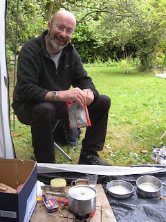 Mr A with the gas stove and pots