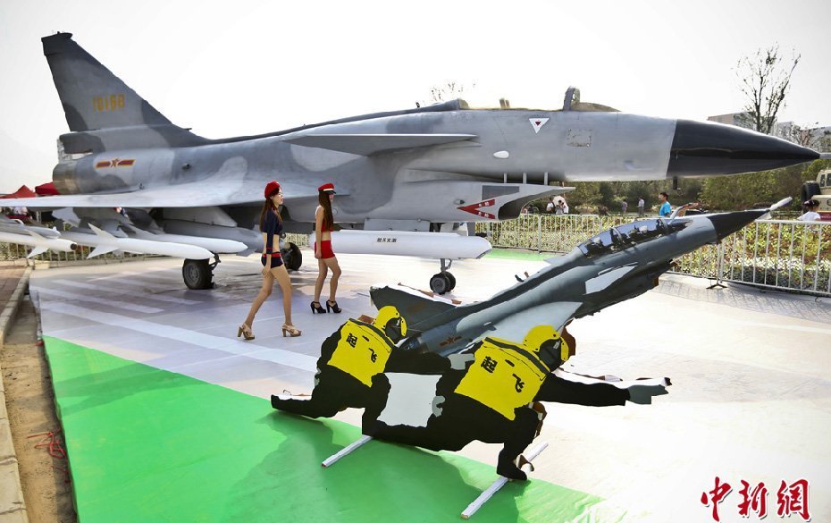 pla+army+sexy+hot+model+chinese+pla+defense+weapons+exhibition+debut+in+Nanjing,+j-10Jian+Shi+aircraft,+amphibious+tanks,+MRAP+vehicles,+armored+vehicles,+anti-aircraft+guns+(4).jpg