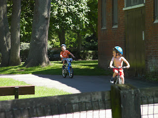 boys riding bikes in the park