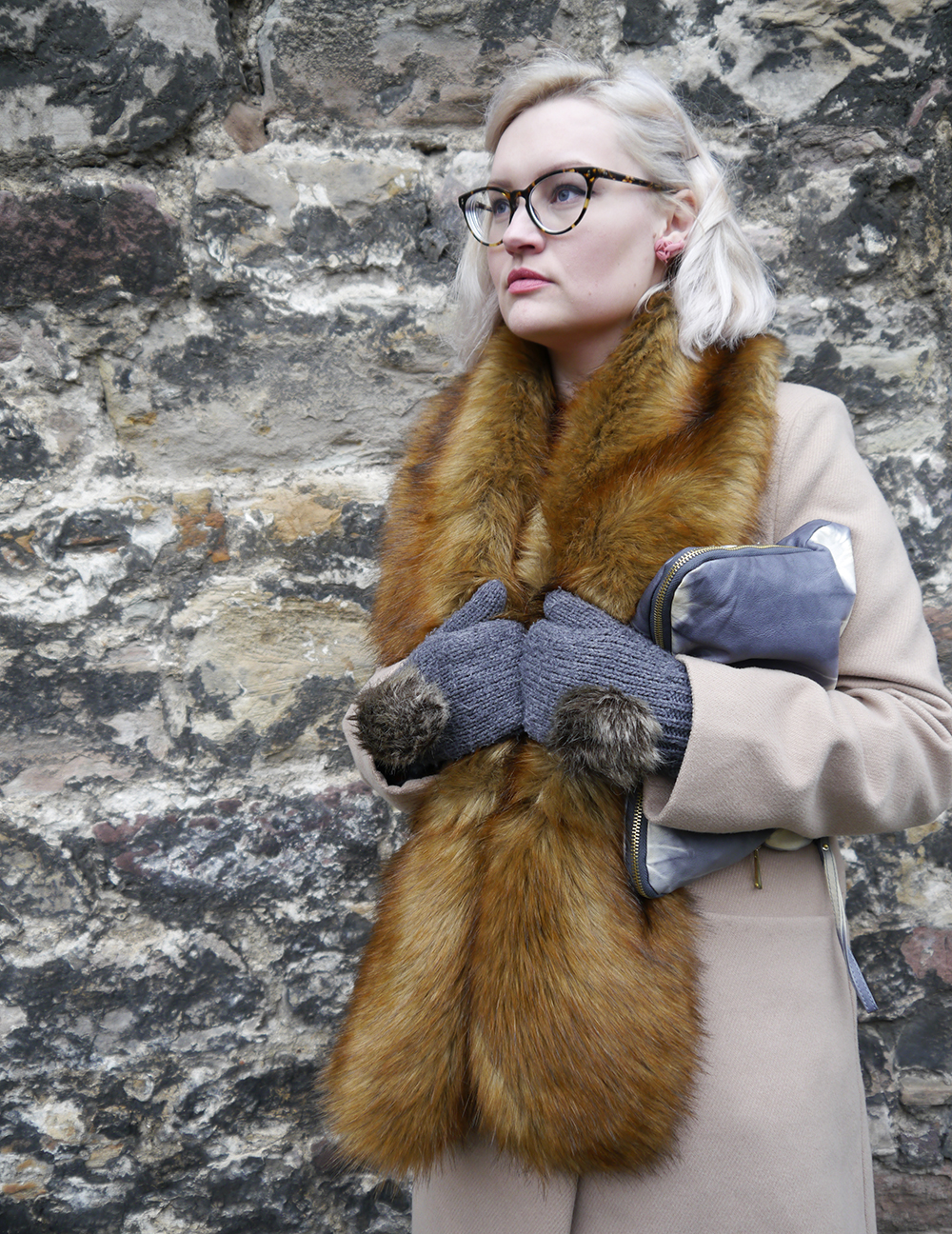 Scottish fashion blogger Wardrobe Conversations wearing faux fur trend at Edinburgh Castle Scottish fashion blogger Wardrobe Conversations wearing faux fur trend with rabbit mittens at Edinburgh Castle