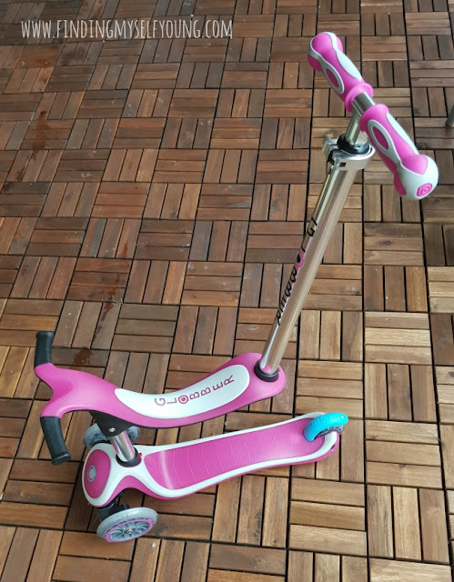 My Free 4 in 1 scooter in seated position with parental control