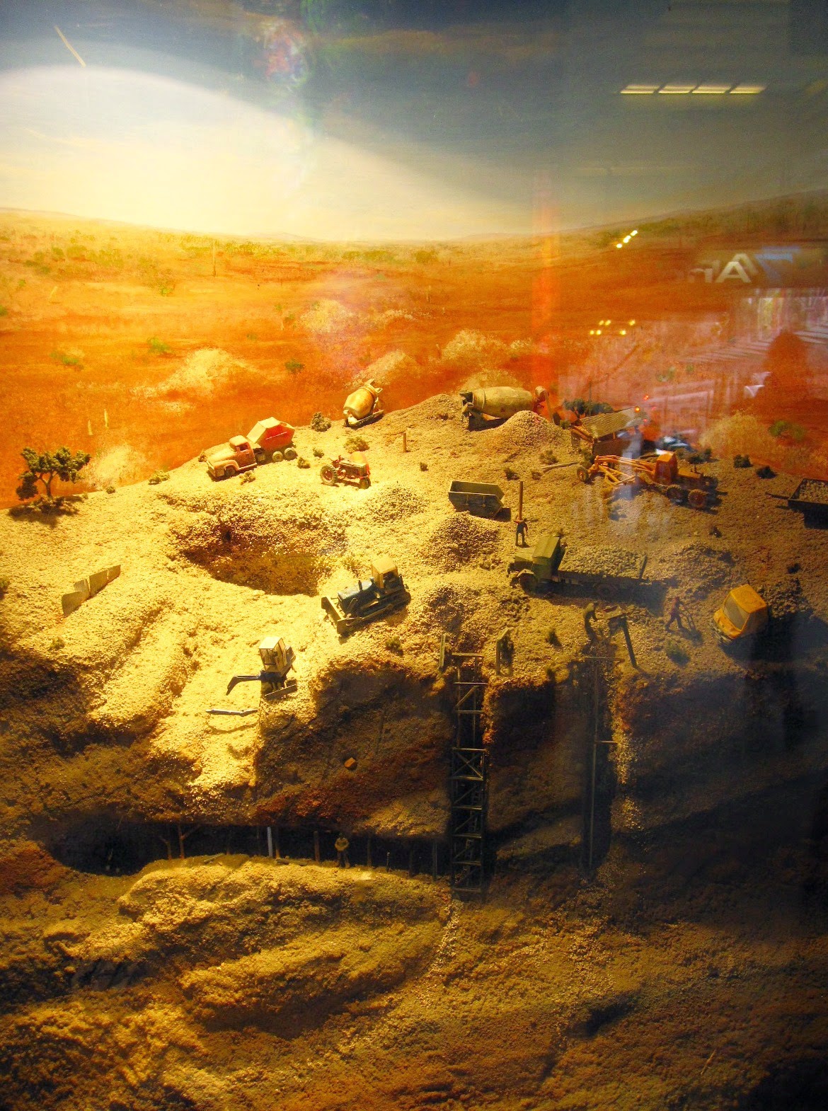 Scale model of an opal mine in a shop window.
