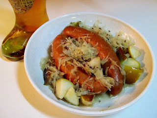 Beer bratwursts with sauerkraut & pear