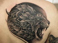 Lion Head Tribal Lion With Crown Tattoo