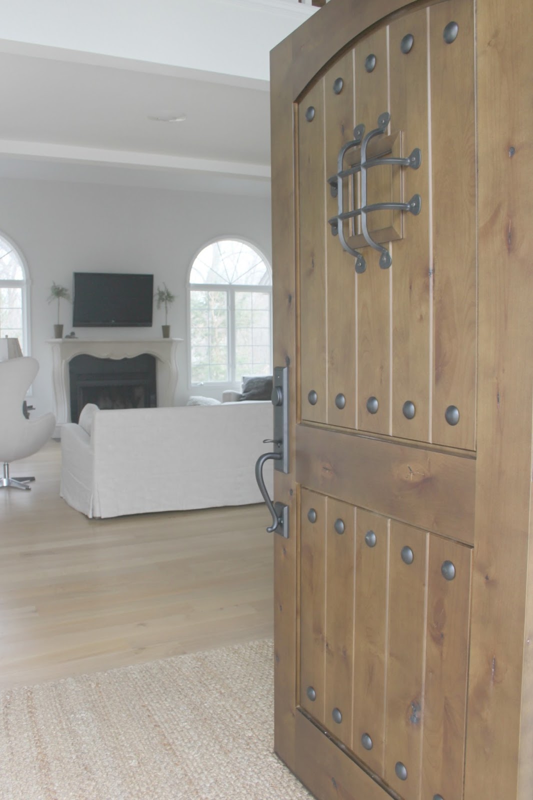 My rustic alder front door - Hello Lovely Studio. Rustic Old World Style Wood Doors [Design Inspiration] with photos of doors old and new to inspire your design ideas.