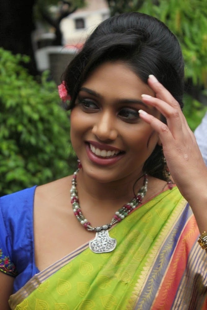 Manisha Yadhav Spicy Stills in Hot Green Saree - CAP