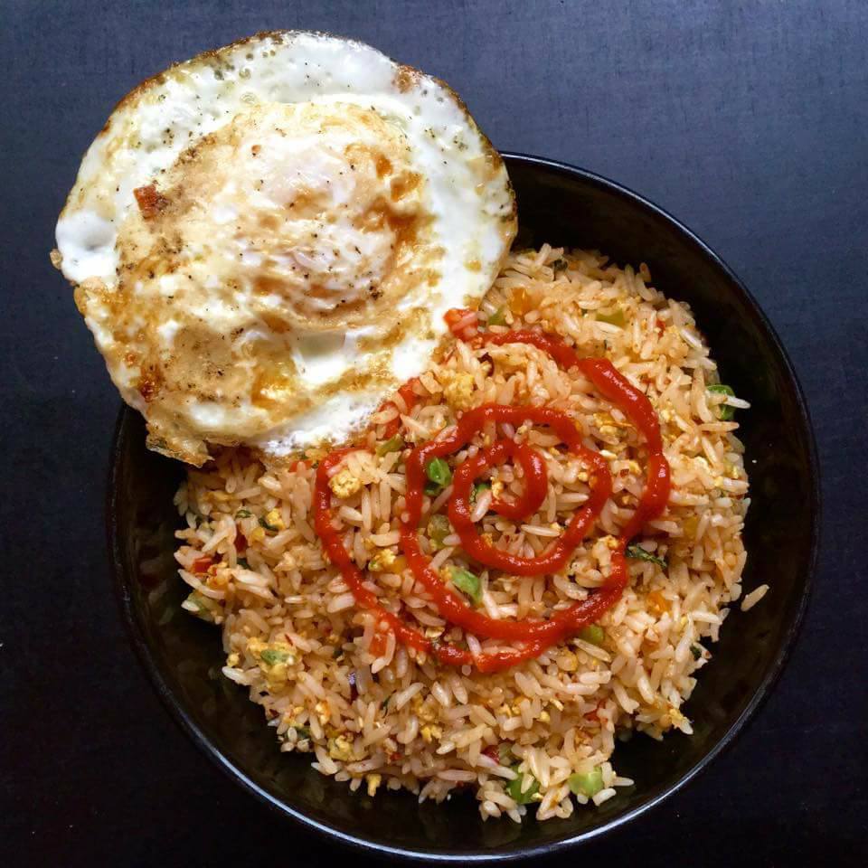 Priya's Page Oriental Egg Fried Rice served with a Fried Egg