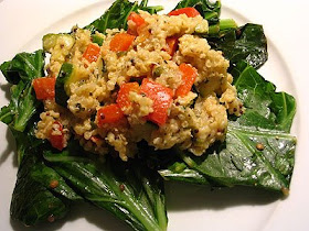 Millet-Quinoa Hash with Peppers and Zucchini on Sautéed Greens