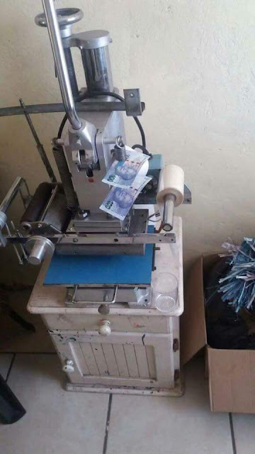  Photos: South African Police arrest Nigerian man found in possession of huge stash of counterfeit money