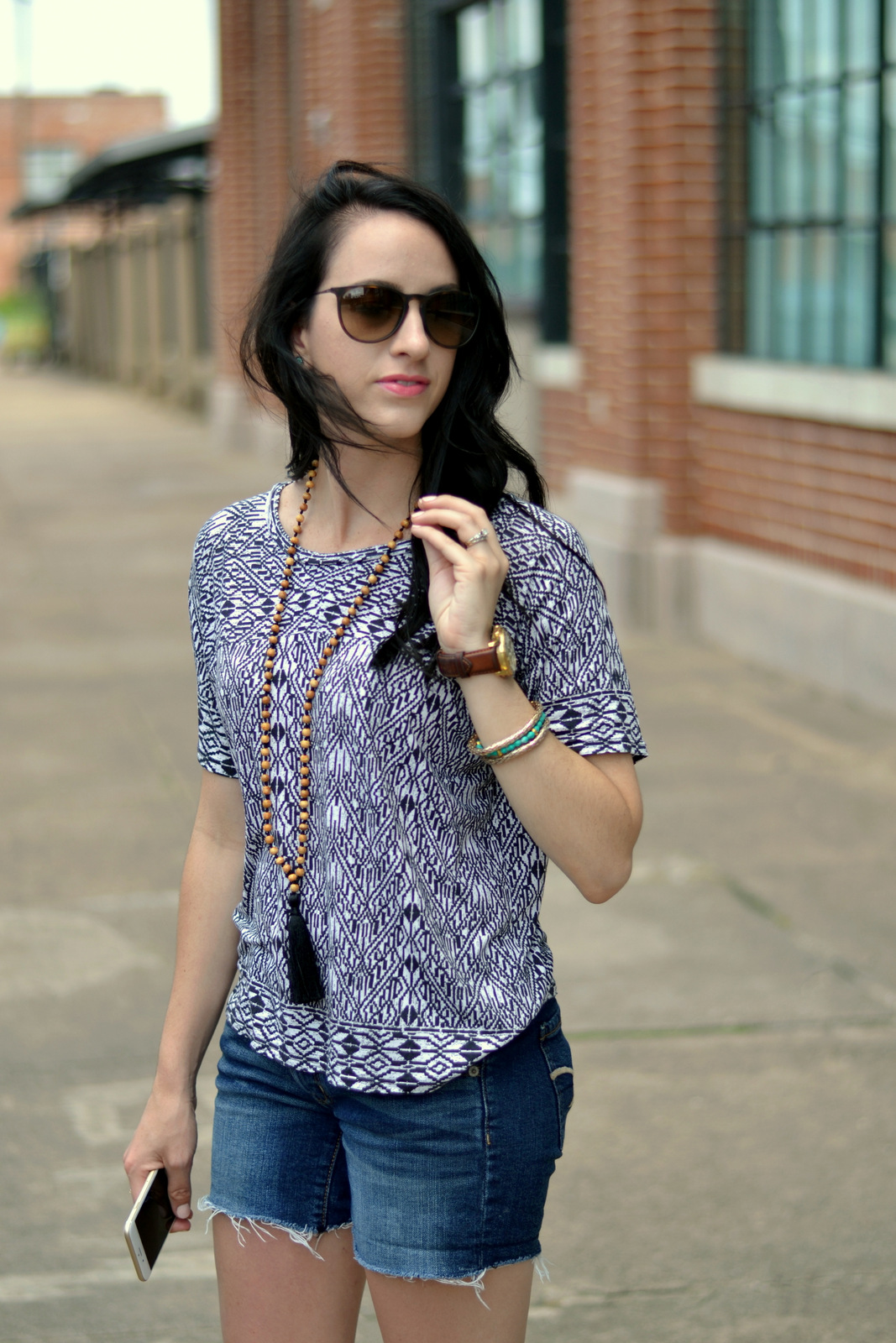 aztec printed tee and tassel necklace
