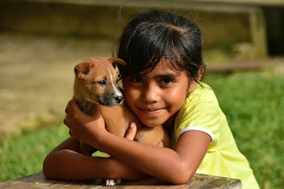 Little girl hugging puppy, by LATUPEIRISSA on Pixabay Image: Little girl hugging puppy, by LATUPEIRISSA on Pixabay