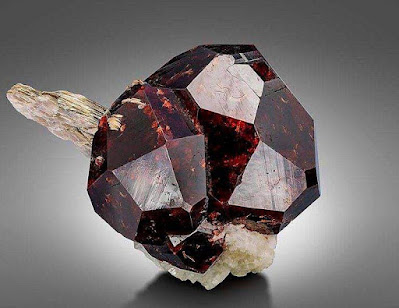 Almandine Garnet Crystal with Muscovite crystals
