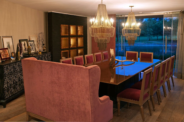 Luxury dining room with red chairs
