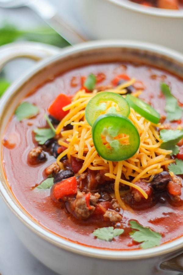 This hearty and delicious Smoky Chipotle Beef Chili is made with ground beef, lots of veggies, beans, and plenty of spices. A little chipotle powder gives the chili a smokiness and just a touch of heat!