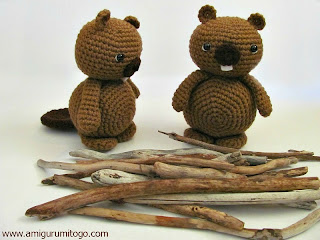 brown crochet beavers with wood