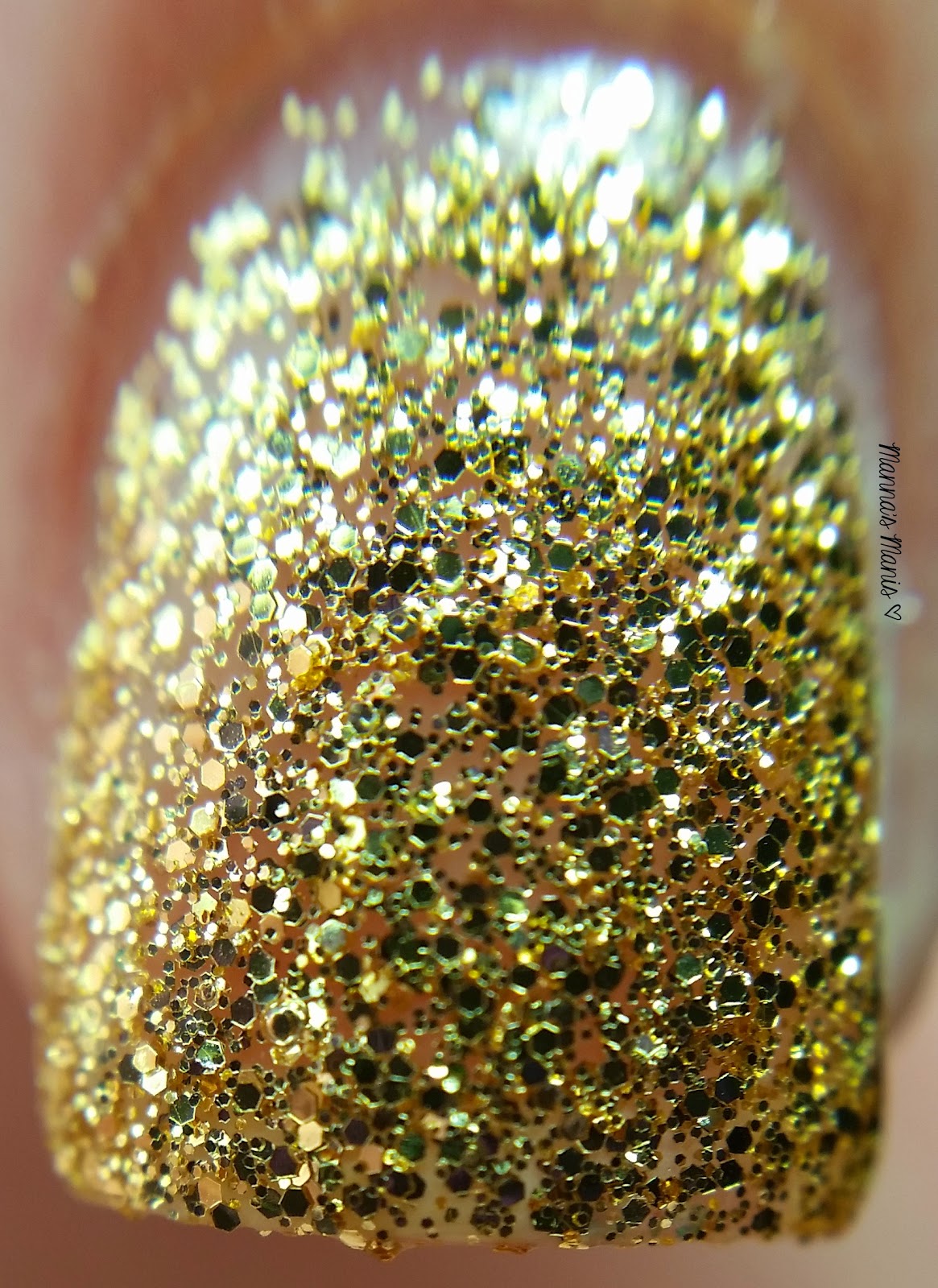 fingerpaints wrapped in ribbon, a full coverage gold microglitter nail polish