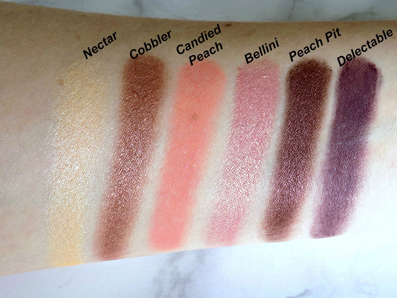Too Faced Sweet Peach palette swatches