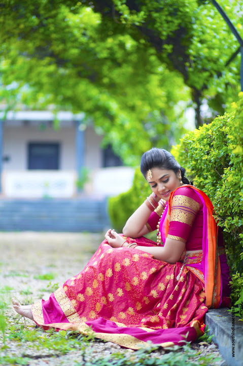 Anchor Sreemukhi in Pink Half Saree