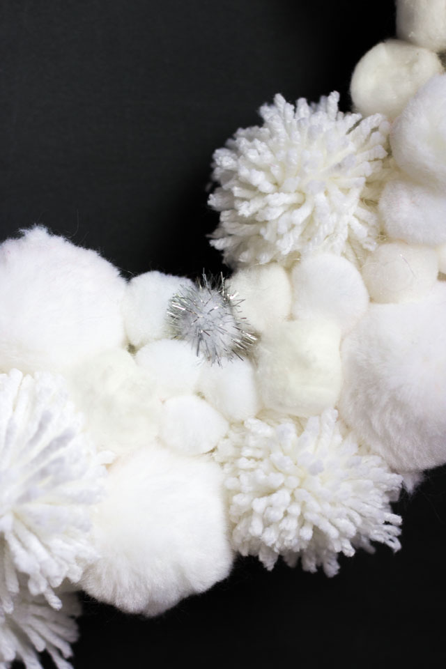 Love this DIY winter wreath bursting with pom-pom snowballs! Love this DIY winter wreath bursting with pom-pom snowballs!