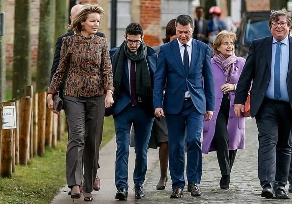 Queen Mathilde visited The Alamire Foundation's House of Polyphony located in the Park Abbey in Heverlee. Armani print jacket