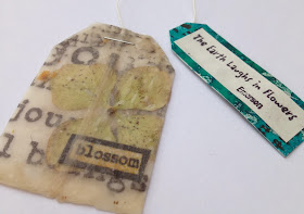 A used tea bag with poetry on it.