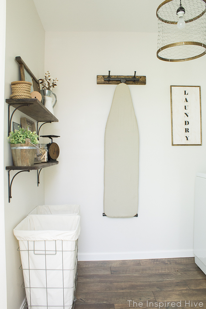 A rustic industrial style laundry makeover with lots of easy DIY decor ideas!