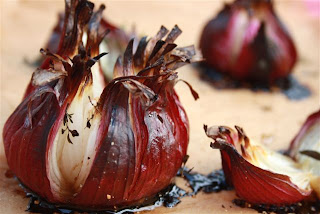 whole roasted red onions with herbs