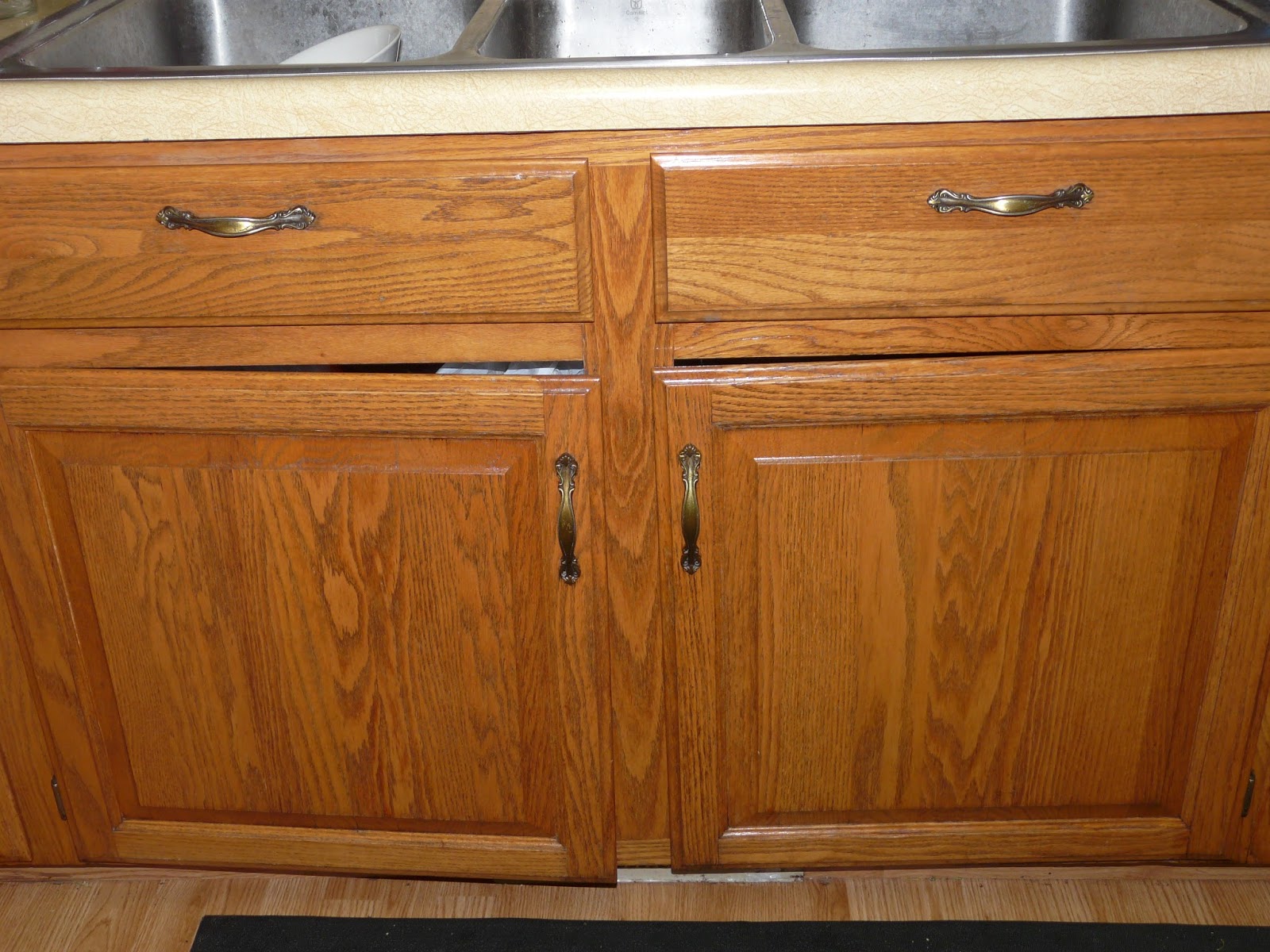 The "Secret" is Gratitude Teak Oil on Bathroom and Kitchen Cupboards