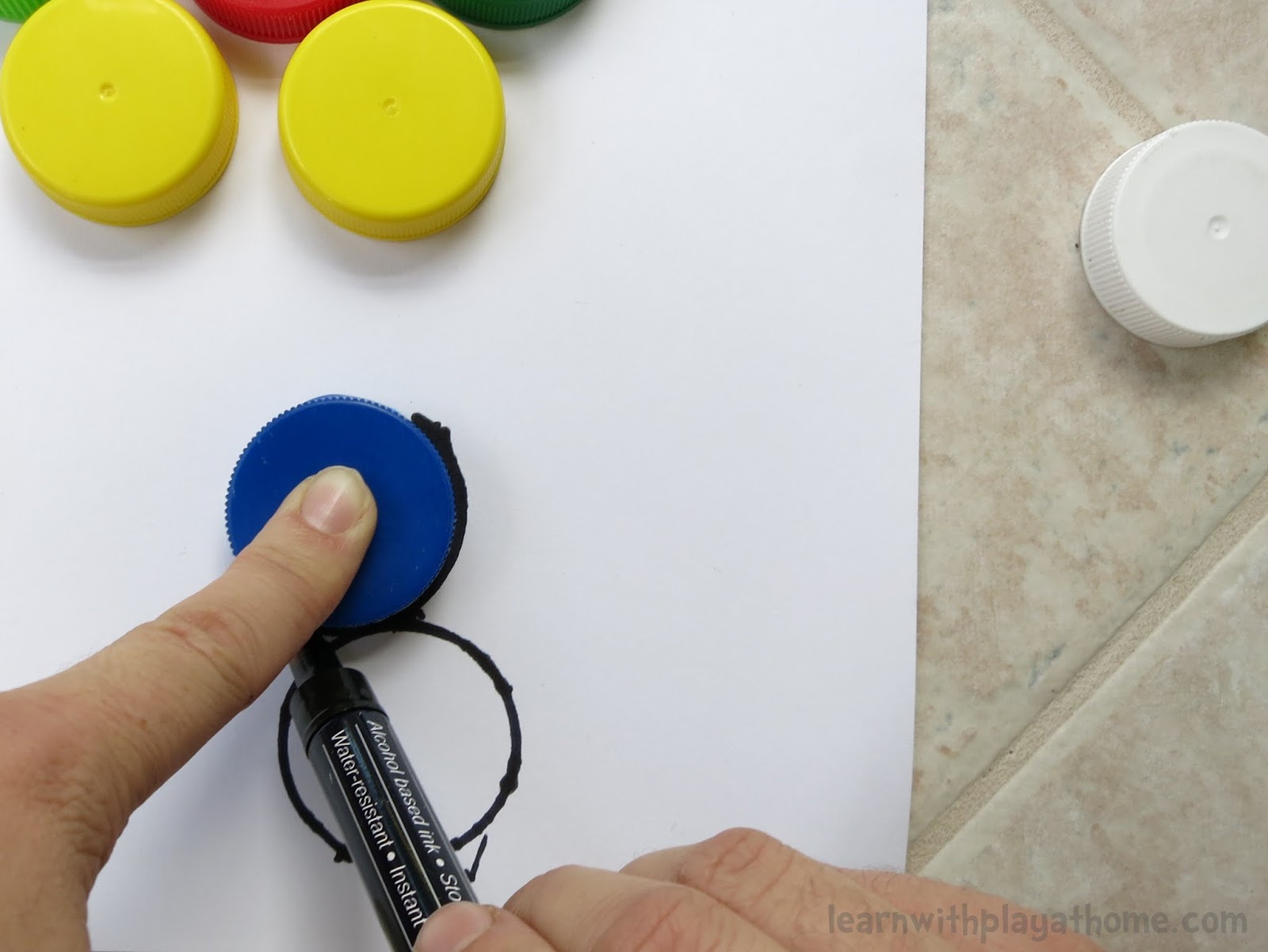 Learn with Play at Home Fun Bottle Top Addition Game. Playful Maths