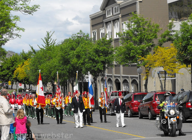 The Shriners carry the flags in the parade includine the National flag of Canada