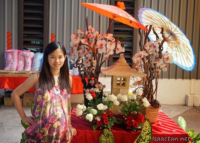 Janice posing with one of the Japanese themed decor setup by Shogun at the venue