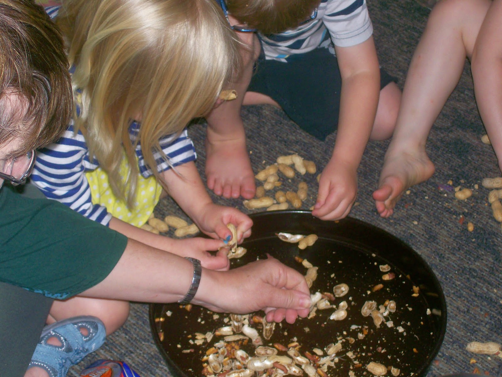 Tree House Preschool Daycare Shelling peanuts to make peanut butter