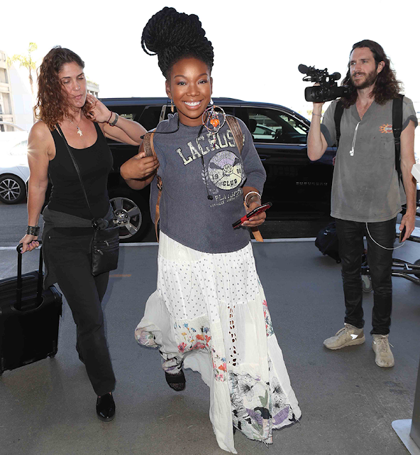 Brandy and her pregnant belly spotted at LAX Airport in Los Angeles