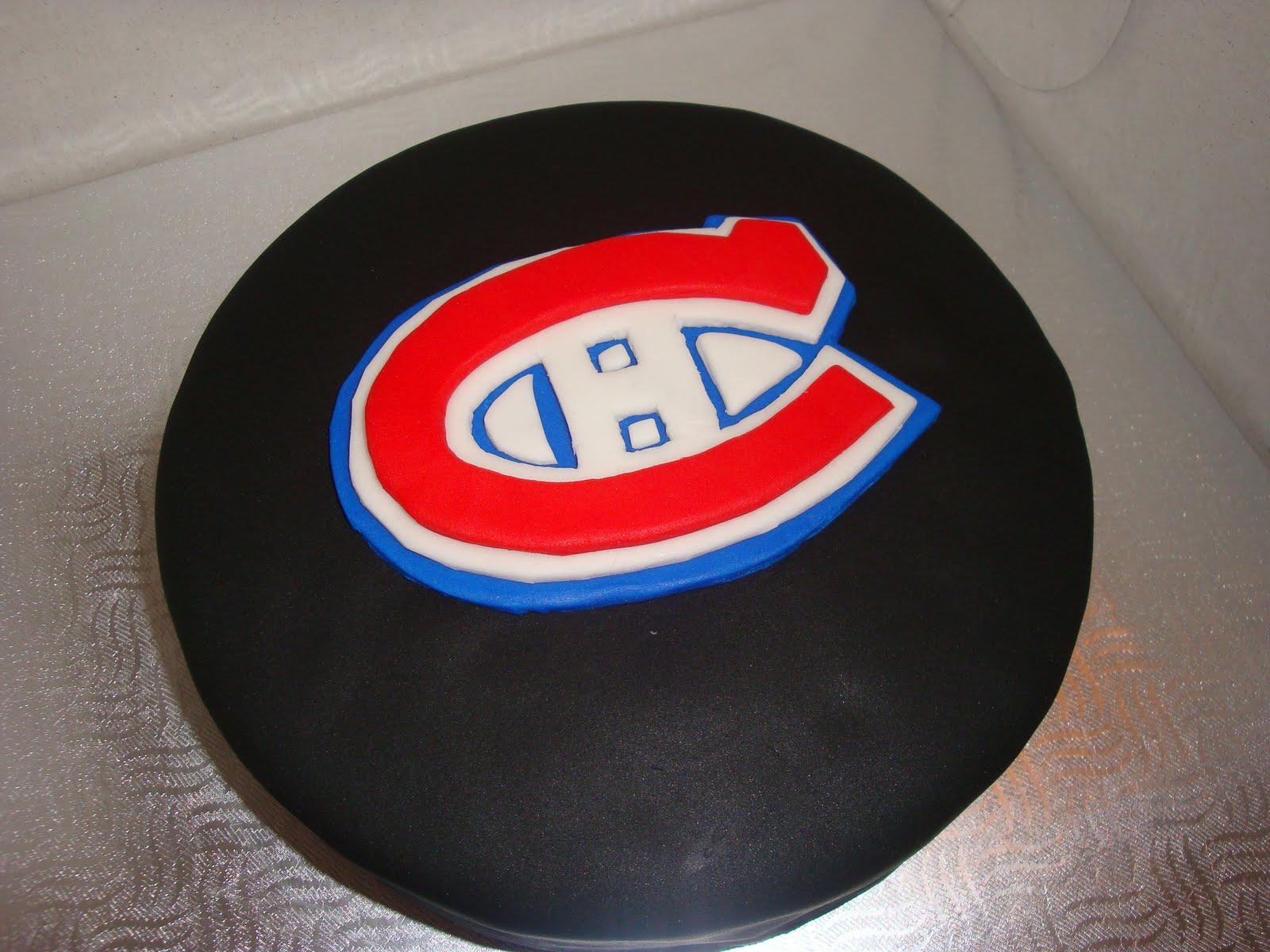 Meletun Délices Rondelle de hockey, CH gâteau
